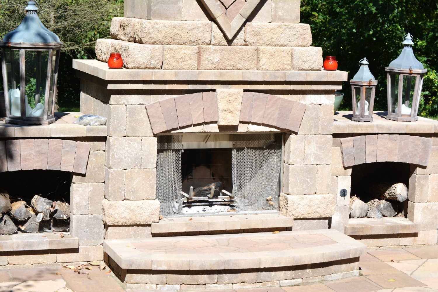 Bricked outdoor fireplace and lighting ornaments